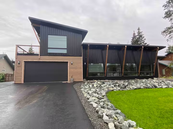 Knoll House modern black-and-cedar exterior in Soldotna, Alaska